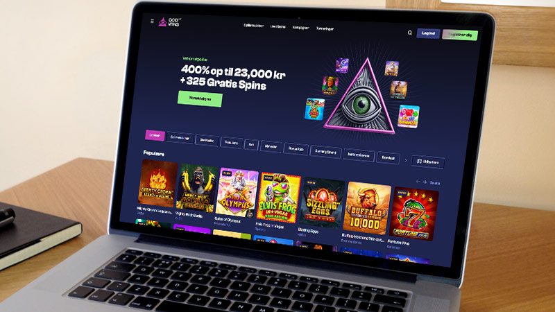 God Of Wins casino hovedside på notebook-skærmen